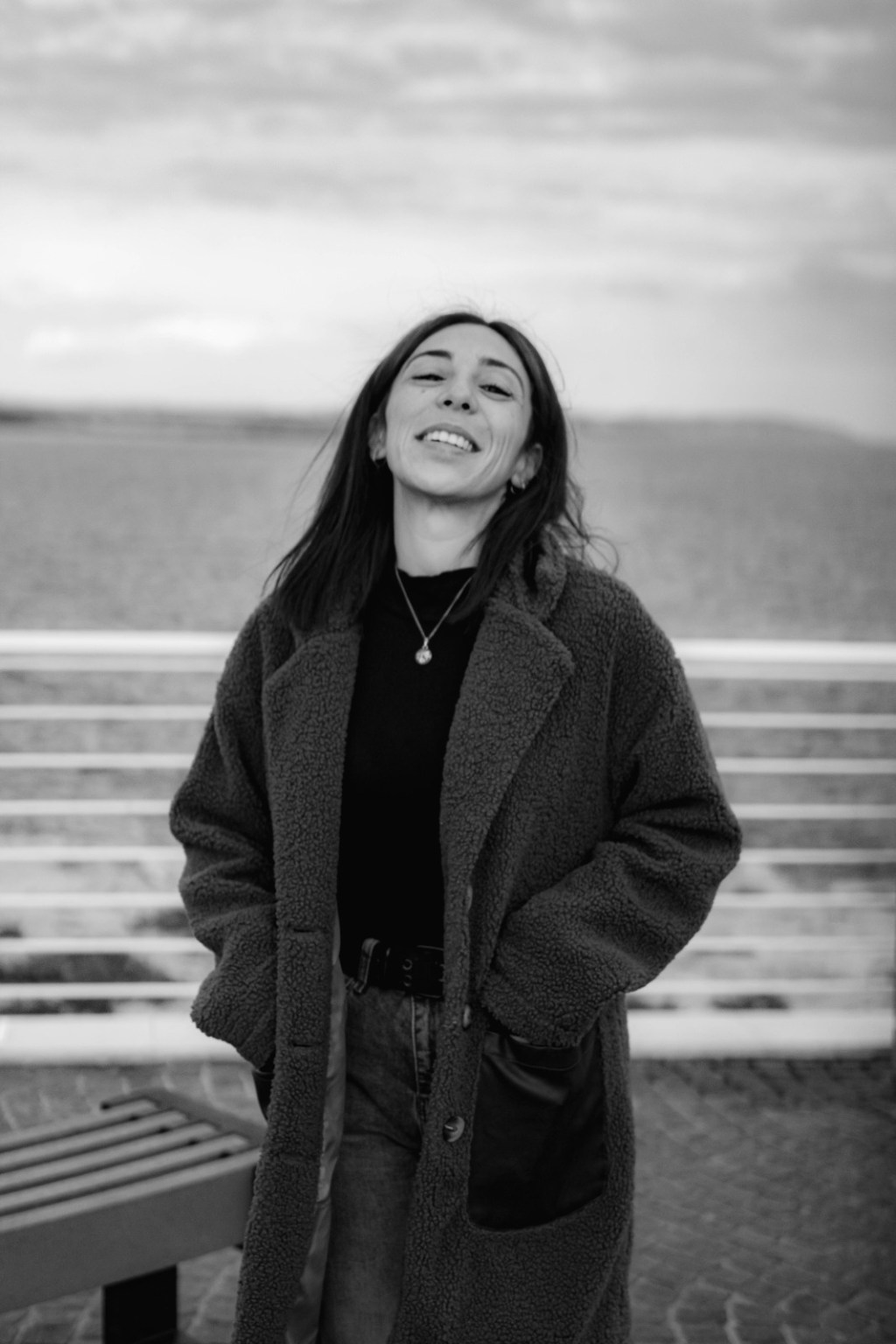 josianne block smiling next to the sea