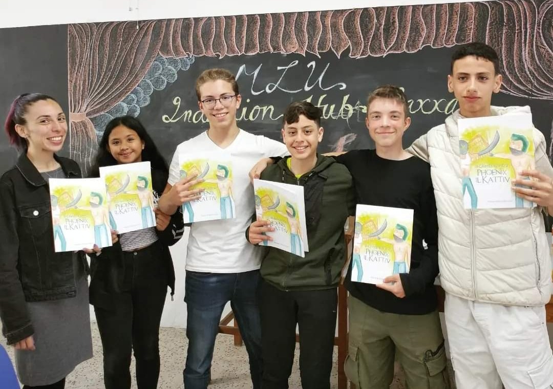 josianne block with her former students at the book launch of their book "phoenix il-kattiv"